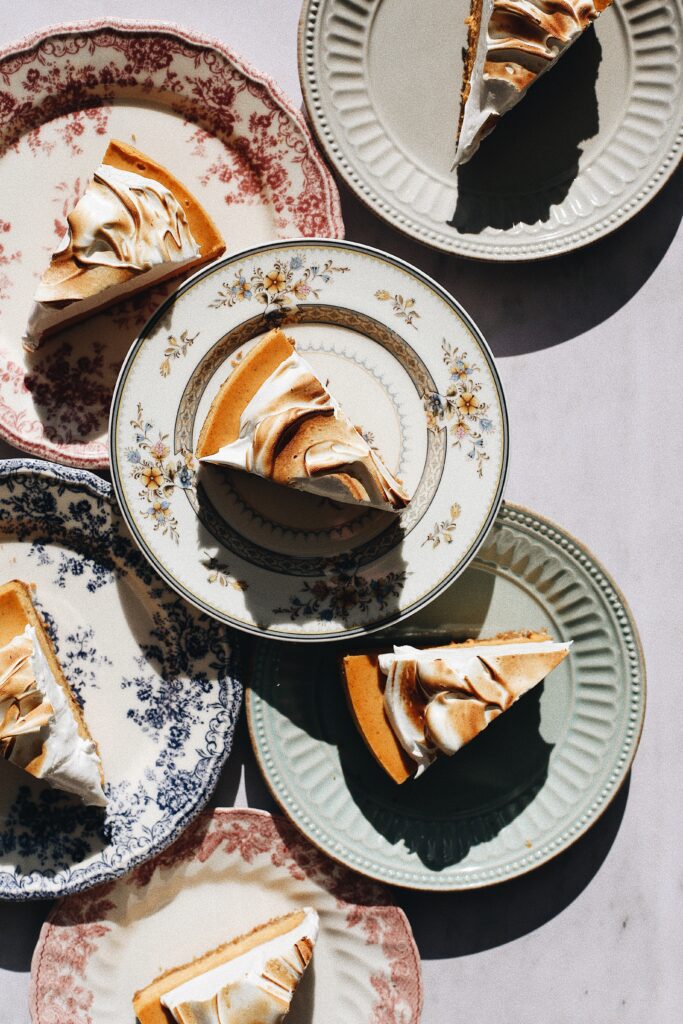 pumpkin cheesecake with gingersnap crust and toasted meringue